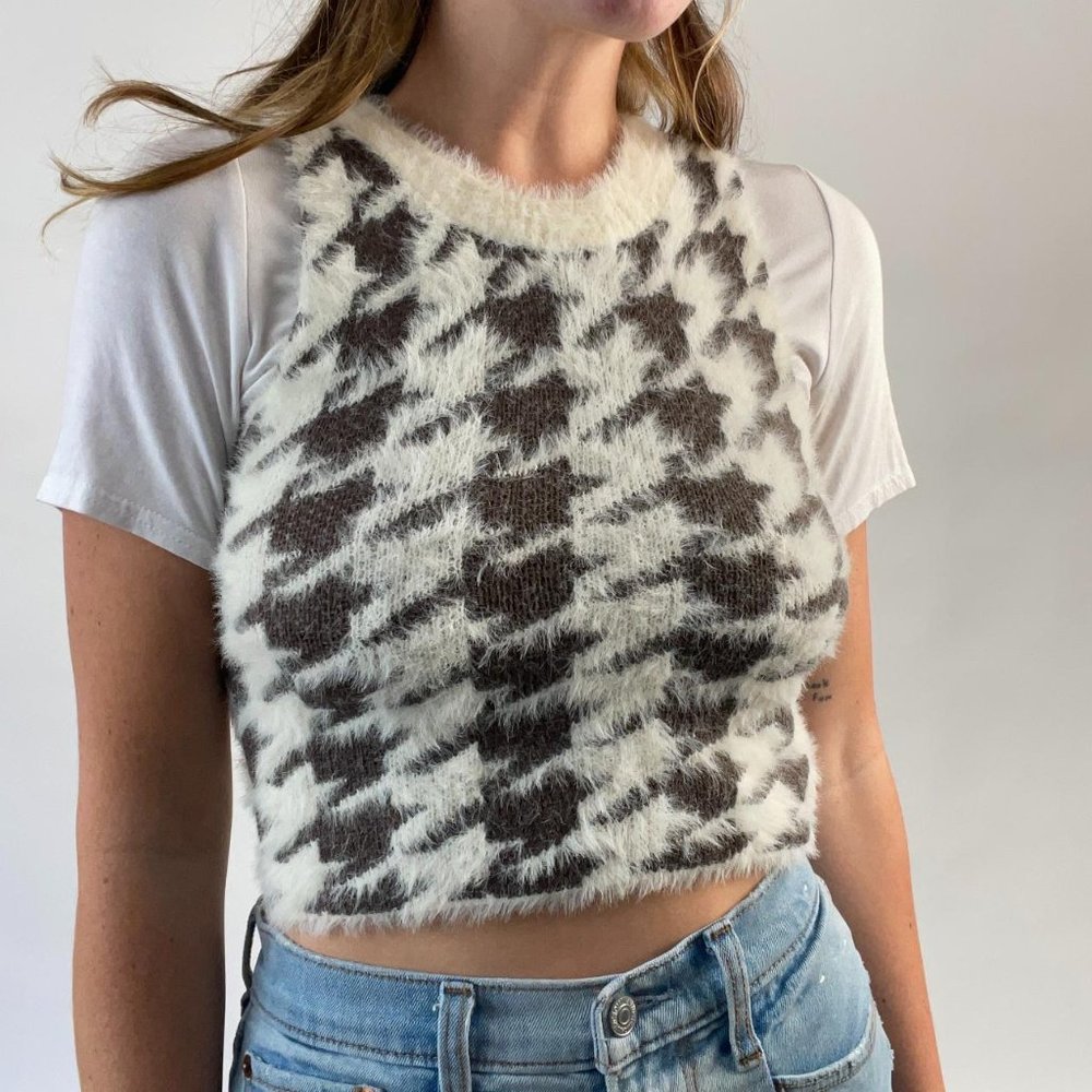 Fuzzy sweater vest.